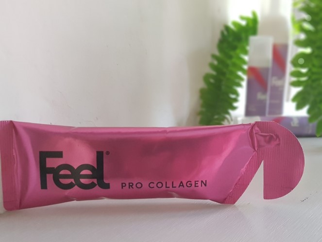 sachet of feel collagen gel in front of a range of feel skincare products obscured in the background