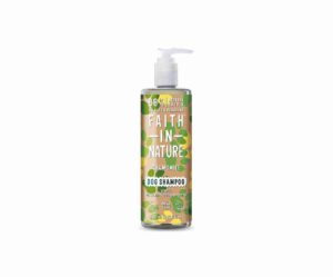 Cylindrical clear plastic bottle with a white pump on top to dispense the contents. The bottle has a yellow green and buff coloured and patterned label on it with the Faith in Nature brand name printed in white, and a description of its contents which is Chamomile Vegan Dog Shampoo